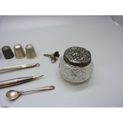 894 - Silver and white metal items: thimbles, a pencil, a frame, whistle, swizzle stick, etc.