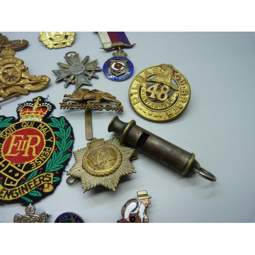 918 - Assorted Regimental badges, two whistles and badges