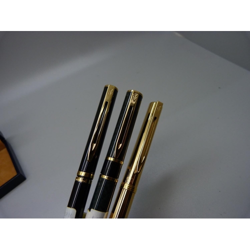 940 - Three Waterman fountain pens, boxed