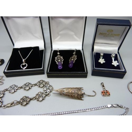 943 - Two pairs of silver earrings, two silver pendant and chains and other jewellery