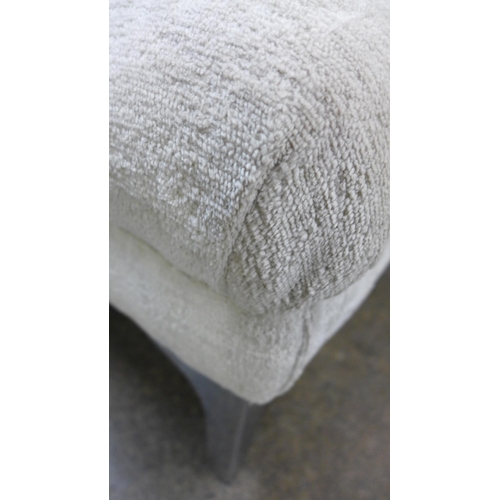 1442 - An ivory velvet buttoned footstool