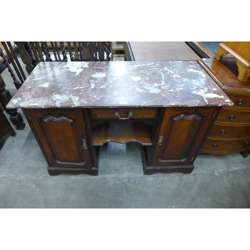 117 - An Edward VII walnut and marble topped washstand