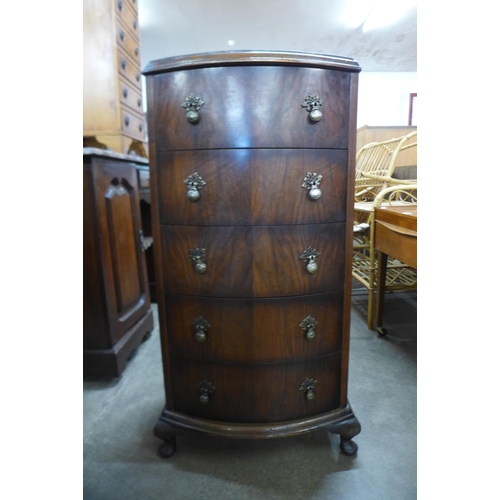 119 - A small walnut chest of drawers