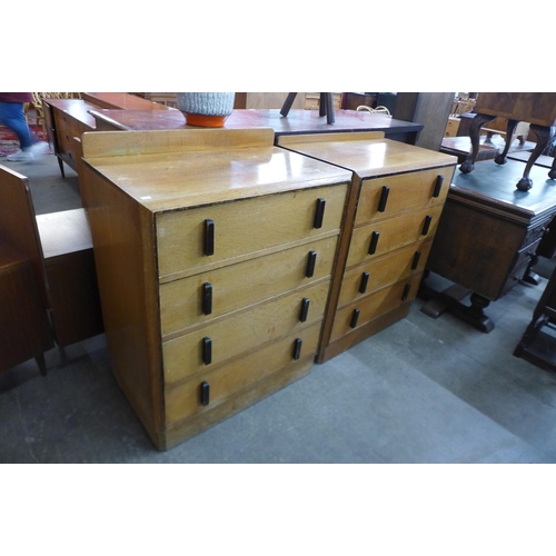 127 - A pair of Art Deco oak chests of drawers