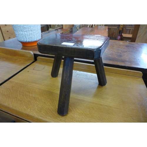 129 - A primitive elm milking stool