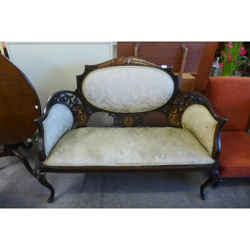 156 - An Edward VII inlaid mahogany and fabric upholstered settee. This lot is for sale with non-transfera... 