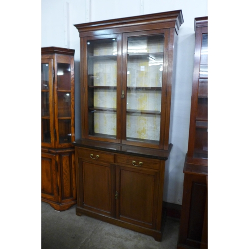 174 - An Edward VII inlaid mahogany bookcase