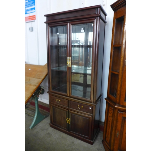 176 - A Chinese hardwood display cabinet