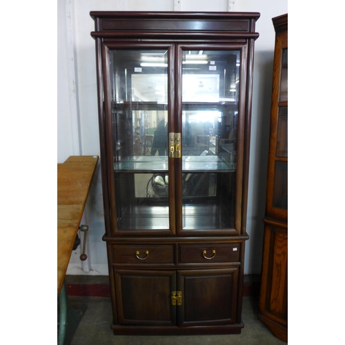 176 - A Chinese hardwood display cabinet