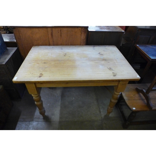 197 - A pine kitchen table