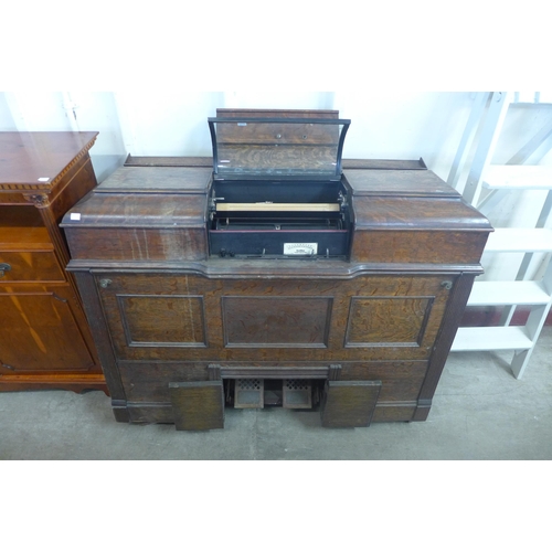 241 - An early 20th Century American oak musical box