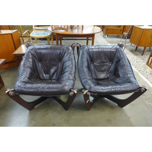 26 - A pair of Odd Knutsen style beech and brown leather Luna chairs