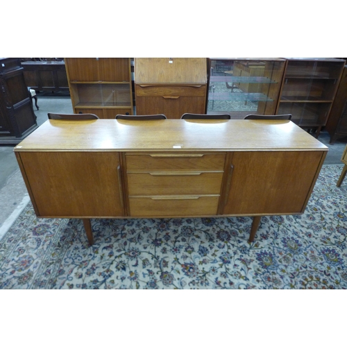 34 - A Morris of Glasgow teak sideboard