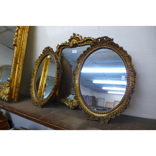 366 - A pair of gilt framed mirrors and another