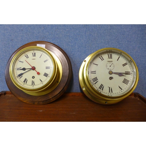 369 - Two brass cased circular ships clocks