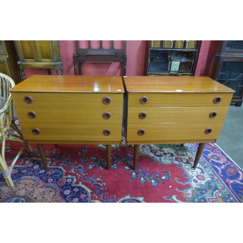 41 - A pair of teak chests of drawers