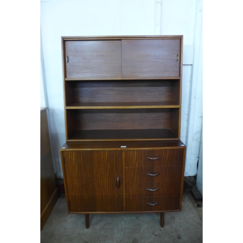 46 - A Herbert Gibbs tola wood bookcase