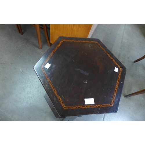 89 - An Arts and Crafts inlaid mahogany hexagonal occasional table