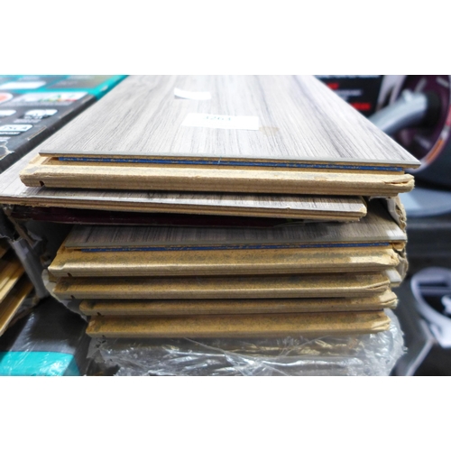 3263 - 2 Packs Of Laminate Flooring Grey Walnut(278-489,490)  * This lot is subject to vat