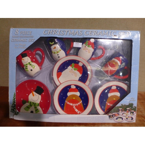 3429 - 2 Christmas ceramic plate and mug sets (one set incomplete)