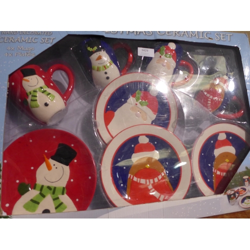 3429 - 2 Christmas ceramic plate and mug sets (one set incomplete)