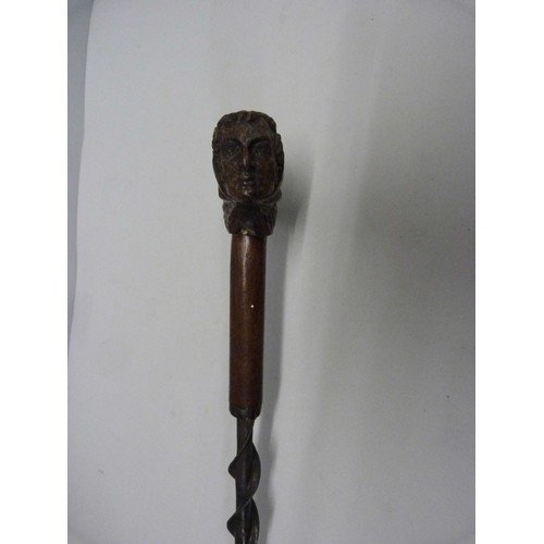 817 - A 19th Century Duke of Wellington 'The Iron Duke' walking stick with carved oak handle and spiral tw... 