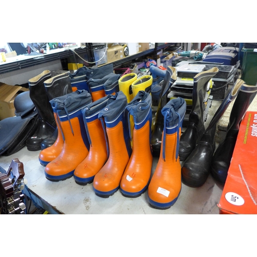 2142 - Horse riding saddle and nine pairs of Wellington boots, mixed sizes mostly Viking Askim and Bogs