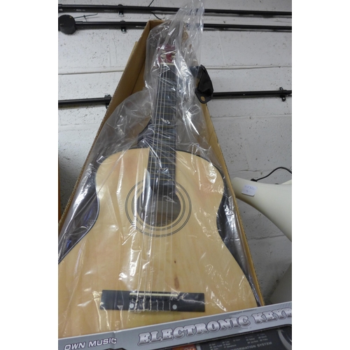 2149 - Academy classic three-quarter size guitar , instructions, spare strings, belt and pick, boxed. Plus ... 