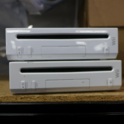 2169 - Two Nintendo Wii consoles, fit board and games