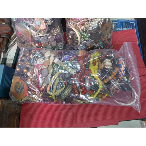 2187 - Three bags, approx 12kg, of mixed costume jewellery