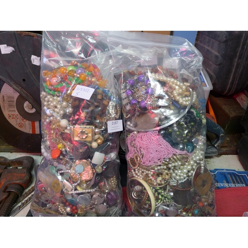 2187 - Three bags, approx 12kg, of mixed costume jewellery