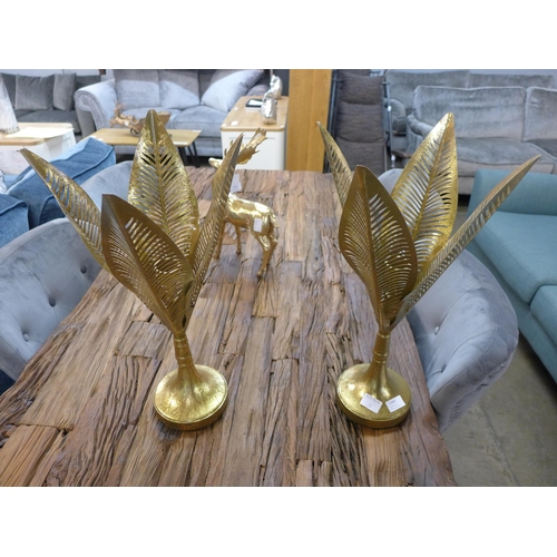 1340 - A pair of gold palm leaf candlesticks