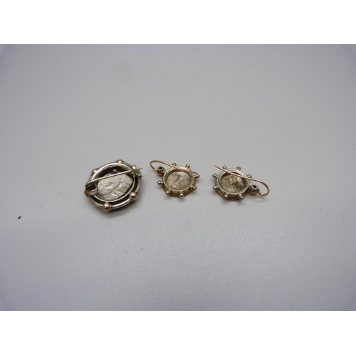 1017 - A pair of silver coin and 9ct gold earrings and matching brooch