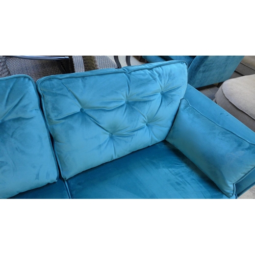 1360 - A Hoxton turquoise velvet three seater sofa