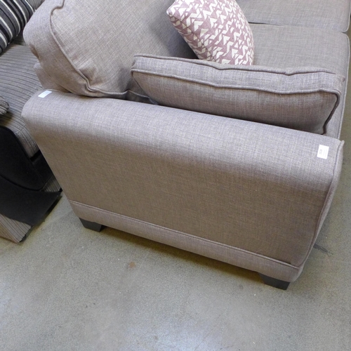 1420 - A light grey upholstered three seater sofa