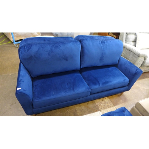 1442 - A blue velvet three seater sofa with choice of back cushions (plain or buttoned)