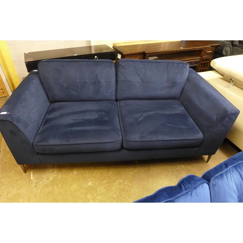 1445 - A deep ocean blue velvet, pinched back cushioned three seater sofa