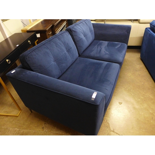 1445 - A deep ocean blue velvet, pinched back cushioned three seater sofa