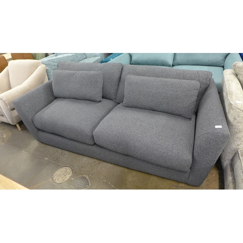 1450 - A grey upholstered three seater sofa