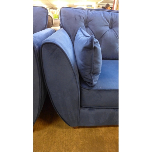 1451 - A pair of Hoxton blue velvet three seater sofas