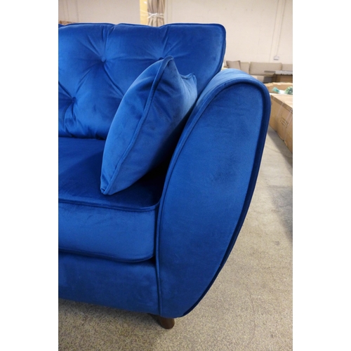 1453 - A Hoxton blue velvet three seater sofa