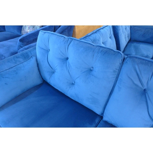 1453 - A Hoxton blue velvet three seater sofa