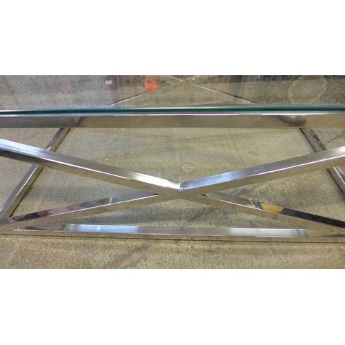 1460 - A chrome and glass top coffee table