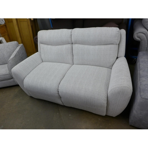 1495 - A champagne and grey fleck high back three seater sofa