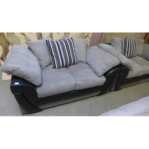 1549 - A grey and black jumbo cord pair of two seater sofas