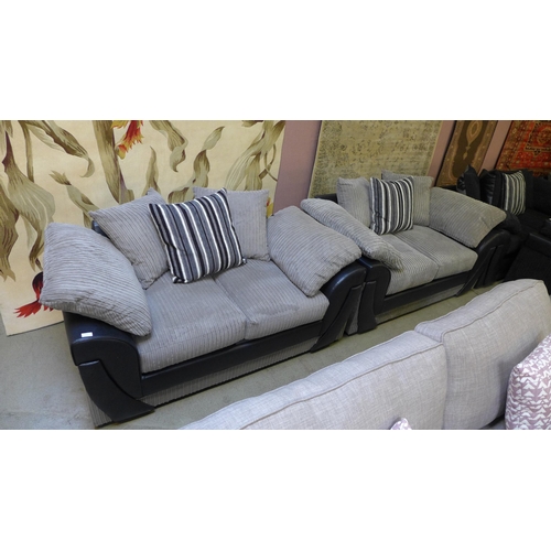 1549 - A grey and black jumbo cord pair of two seater sofas