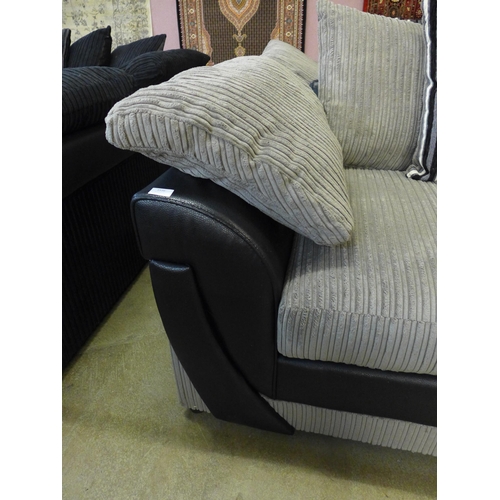 1550 - A mink and black jumbo cord pair of two seater sofas