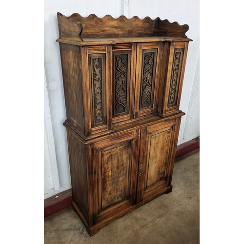 83E - A late 19th/early 20th Century French carved beech fitted six door cupboard