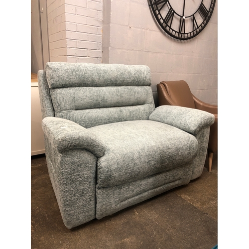 1495A - A sea green upholstered two seater sofa