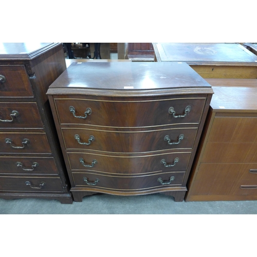 106 - A George III style mahogany serpentine chest of drawers